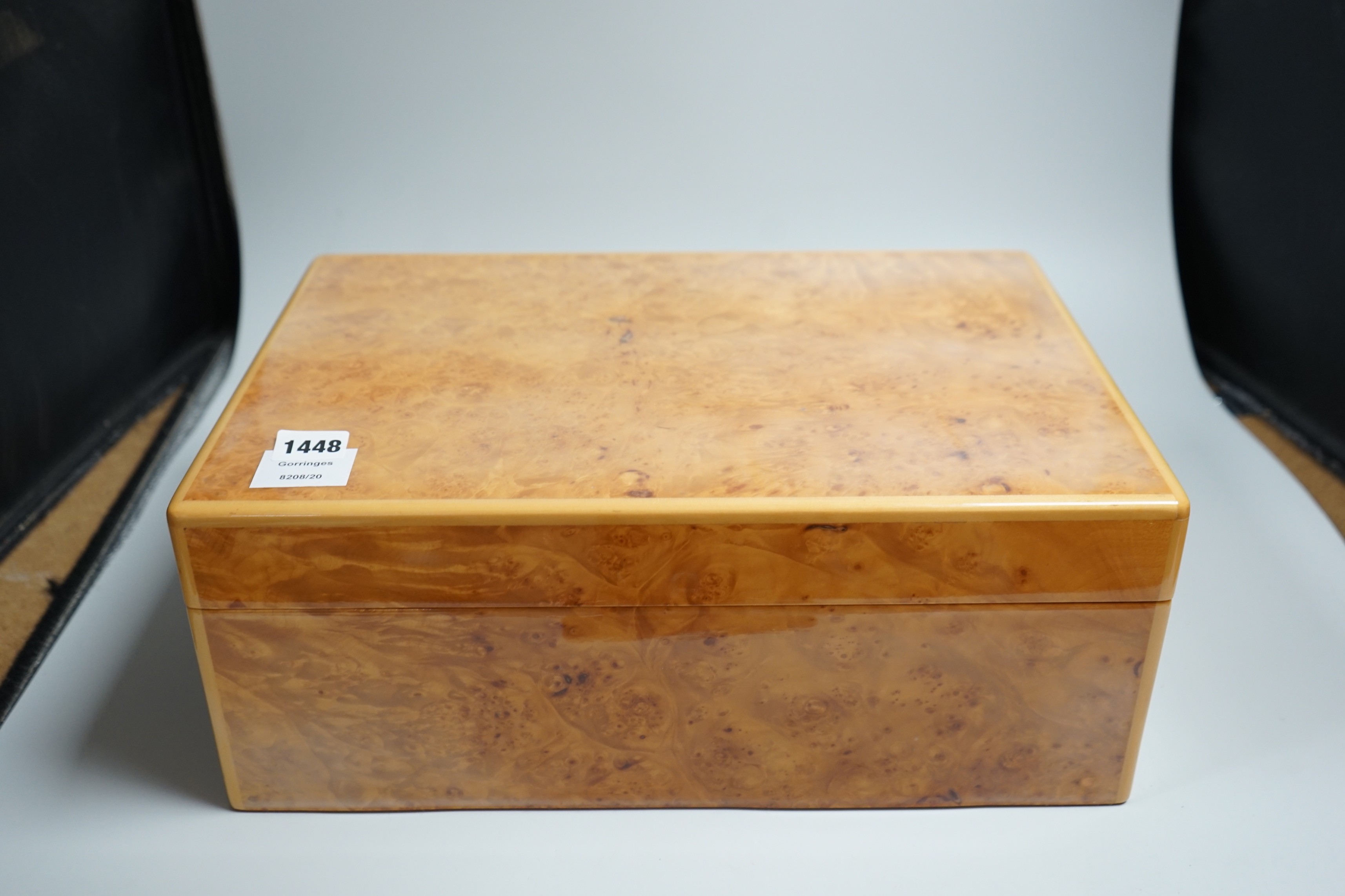 A birds eye banded maple veneered Habanos humidor, 17cms x 42cms